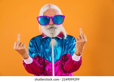 Senior man with eccentric look  - 60 years old man having fun, portrait on colored background, concepts about youthful senior people and lifestyle - Shutterstock ID 2149099299