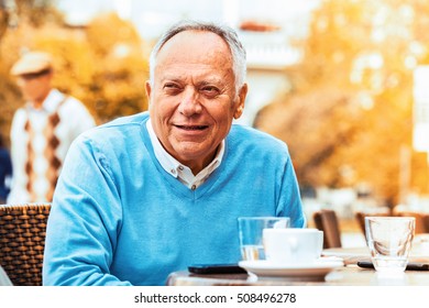 Senior Man Enjoying City Early In The Morning.