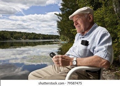Senior man enjoying a day at the lake