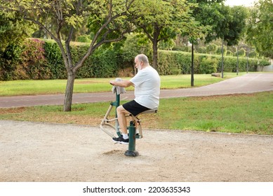 Senior Man Exercising On Outdoor Gym In The Park Sporty Lifestyles And Slimming Concept