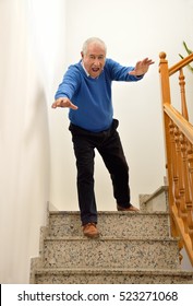 Senior Man Falling Down On The Stairs