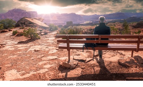 Senior man gazes at early morning landscape in Capital Reef, Utah - Powered by Shutterstock