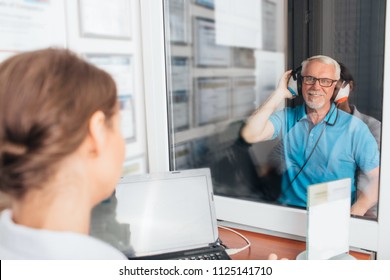 Senior Man Getting A Hearing Test At A Doctors Office, Audiometer Hearing Test