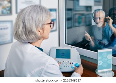 Senior Man Getting Hearing Test At Audiology Center. Audiometry, Hearing Check-up