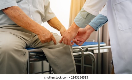 Senior Man Has Knee Pain Problem Elderly Grandfather Visiting Male Doctor To Check Up Health Problems And Consulting Way To Protect Suffering From Knee.