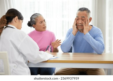 senior man have a headache when to visit a doctor in the hospital - Shutterstock ID 2369937959