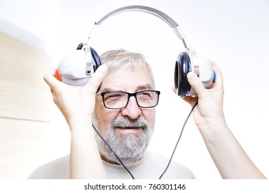 Senior Man With Headphones - Hearing Test 