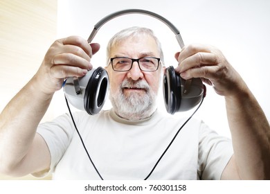 Senior Man With Headphones - Hearing Test 