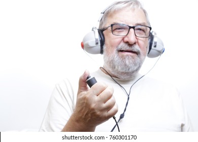 Senior Man With Headphones - Hearing Test 