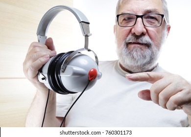 Senior Man With Headphones - Hearing Test 