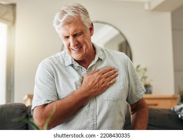 Senior man, heart attack and stroke at home for emergency health risk, breathing problem and cardiology accident. Sick elderly male with chest pain cancer, cardiovascular disease and heartburn injury