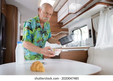 Senior Man In His Camping Van