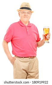 Senior man holding a pint of beer isolated on white background