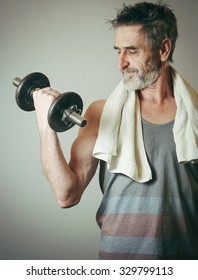 Senior Man Lifting Weights 