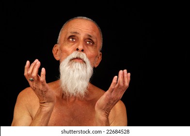 A Senior Man Looking Heavenward In A Prayerful Or Pleading Pose.