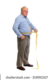 Senior Man Measuring Waist With A Tape. Lose Weight Concept.