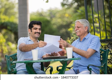 Senior Man Meeting With Their Financial Advisor 