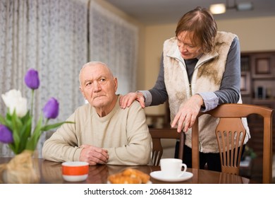Senior man offended after quarrel with wife - Shutterstock ID 2068413812