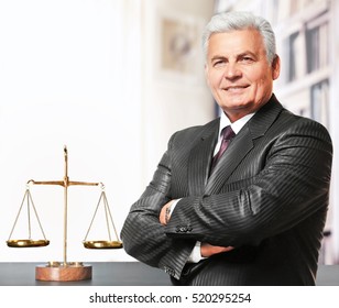 Senior Man At Office. Law And Justice Concept.