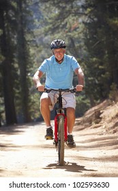 Senior Man On Country Bike Ride