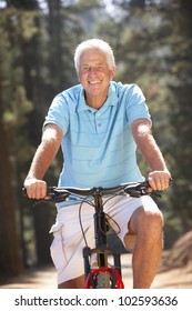 Senior Man On Country Bike Ride