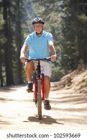 Senior Man On Country Bike Ride