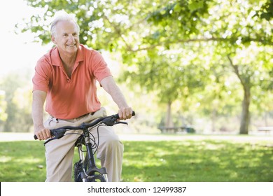 Senior man on cycle ride in countryside