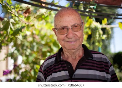 Senior Man Over 80, Portrait In Outdoors.