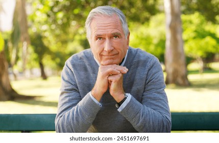 Senior, man or park with hands for thinking on retirement, contemplating or planning for holiday. Male person or elderly with thought or idea in garden for vacation, relax in nature or hope for life - Powered by Shutterstock