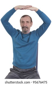 Senior Man Performing Chair Yoga On White Background