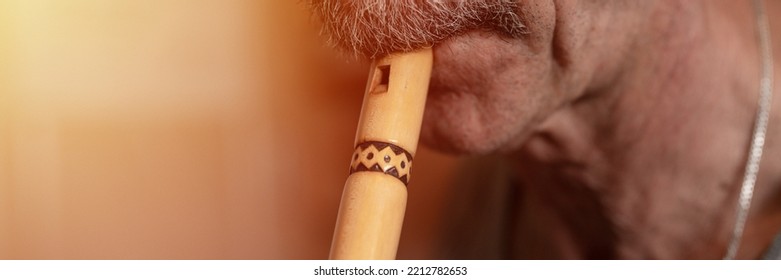 Senior Man Playing Flute. Faceless Unprofessional Male Elderly Caucasian Recorder People With Moustache With Mouth And Lips Play On Pipe Amateur Music Close Up Home. Hobbies And Leisure. Banner. Flare