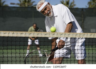 Senior Man Playing Tennis