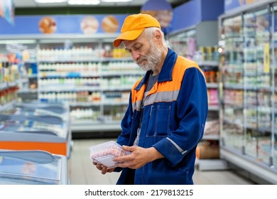 Senior Man Reading Food Label Product At The Supermarket. Mature Man Buying Groceries In Food Store