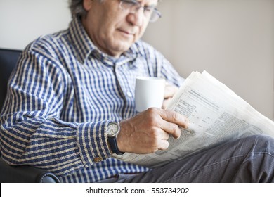 Senior Man Reading Newspaper