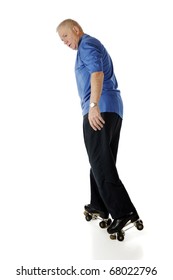 A Senior Man Roller Skating Backwards.  Isolated On White.