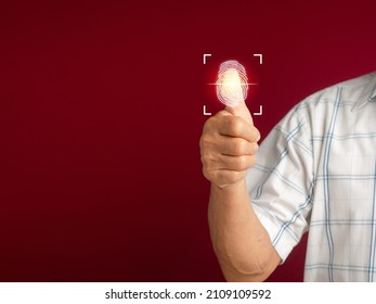 Senior man scans fingerprint biometric identity to access personal data. The future of security and password control through fingerprints. Concept of technology future and cybernetic.