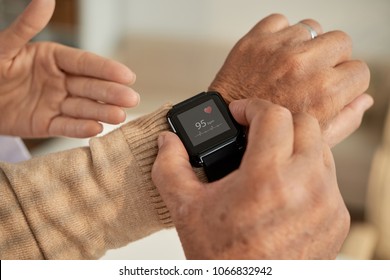 Senior Man Setting Health Application In His Smart Watch
