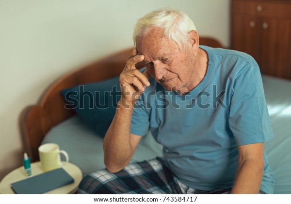 Senior Man Sitting On Bed Home Stock Photo 743584717 | Shutterstock