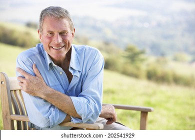 Senior Man Sitting Outdoors