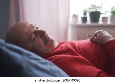 Senior Man Sleeping Having Sweet Dream On Bed In Bedroom In The Morning