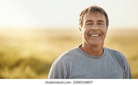 Senior man, smile and portrait at field in summer for outdoor adventure, nature and holiday. Sunshine, happy and face of person by mockup space for weekend vacation, peace and tourism in Turkey - Powered by Shutterstock