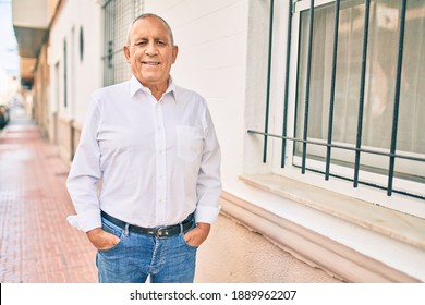 Senior Man Smiling Happy Walking At The City.