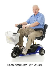 A senior man smiling at the viewer as he's ready to drive away on his scooter.  On a white background