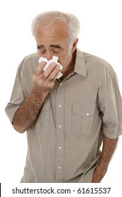 Senior Man Sneezing Isolated On White