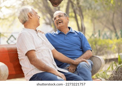 Senior man spending free time at park. - Powered by Shutterstock