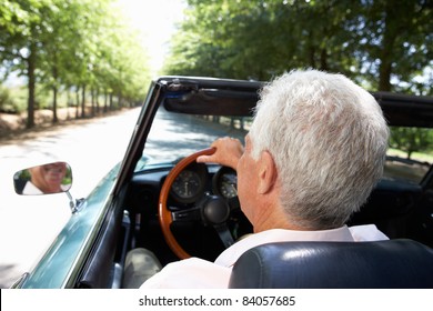 Senior Man In Sports Car