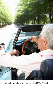 Senior Man In Sports Car