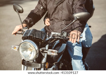 Similar – Senior man repairing damaged motorcycle engine