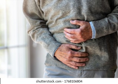 Senior Man With Stomach Pain
