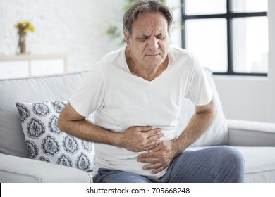 Senior Man With Stomach Pain